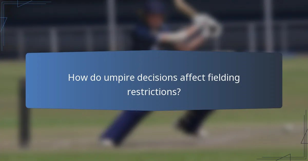How do umpire decisions affect fielding restrictions?