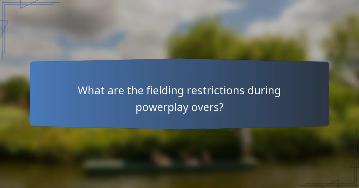 What are the fielding restrictions during powerplay overs?